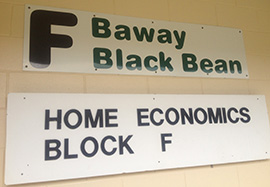 Wall sign saying 'F Baway BlackBean' and 'Home Economics Block F